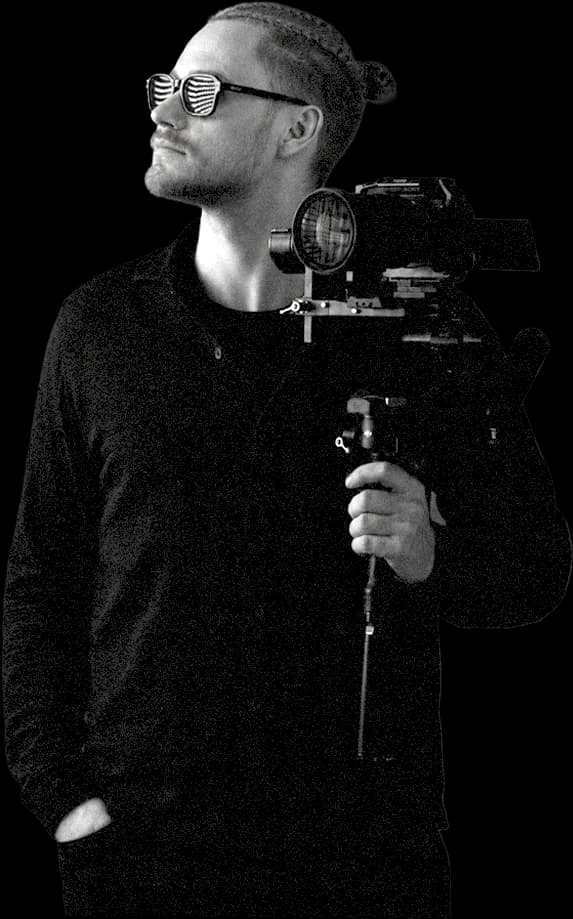 Videographer from the Mavrodiev Project team shouldering a cinema camera rig