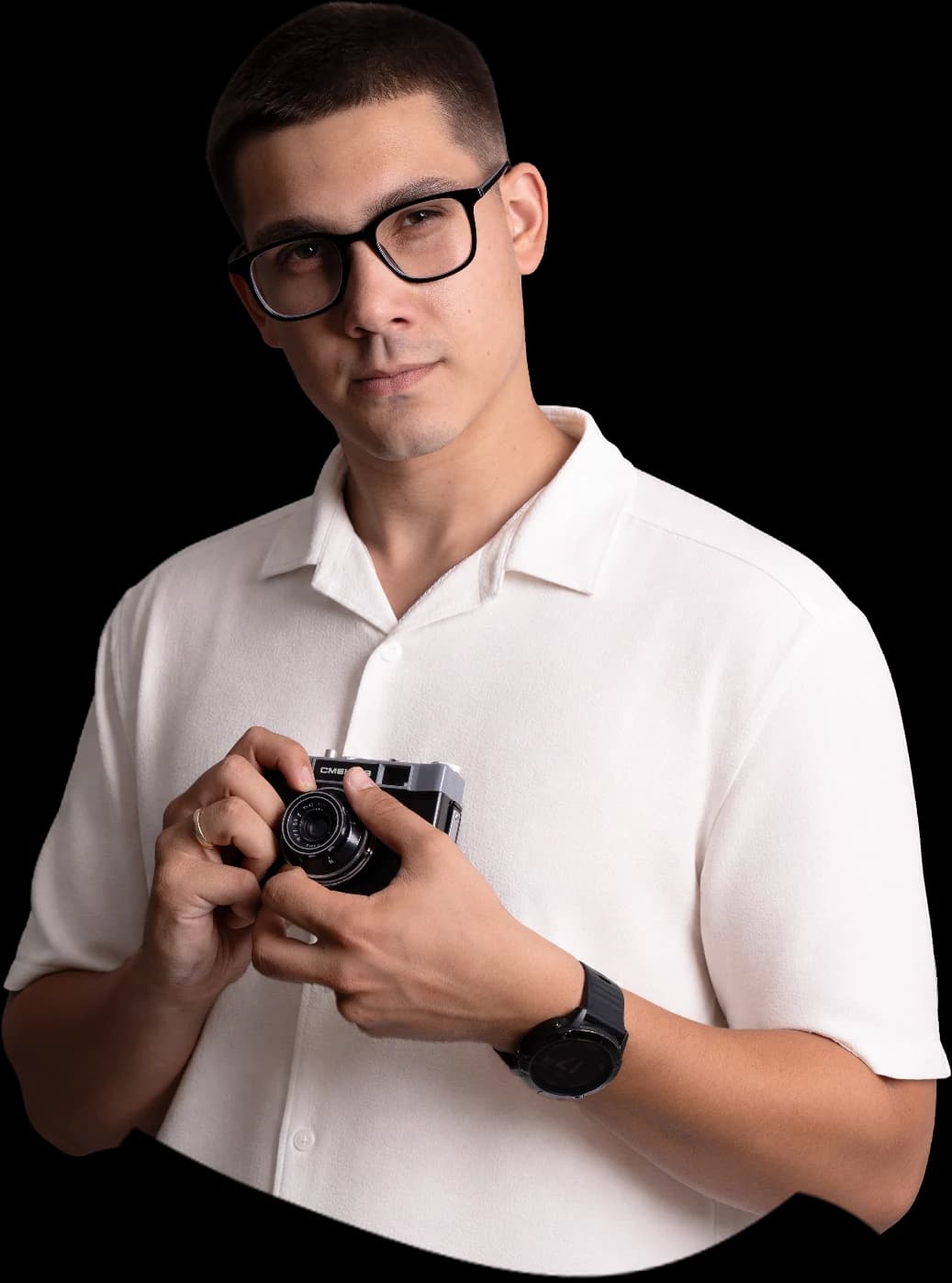 Stanislav Marinov, head of content, holding a compact camera